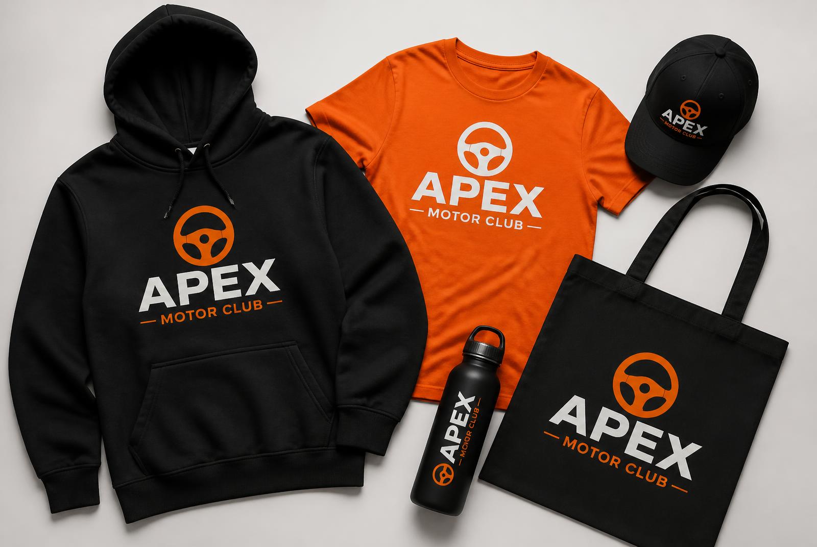 Flat lay of branded car club hoodie, t-shirt, cap, bottle and tote bag
